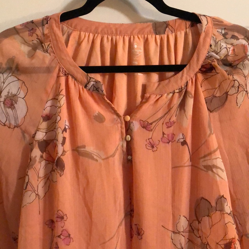 Light floral colored blouse